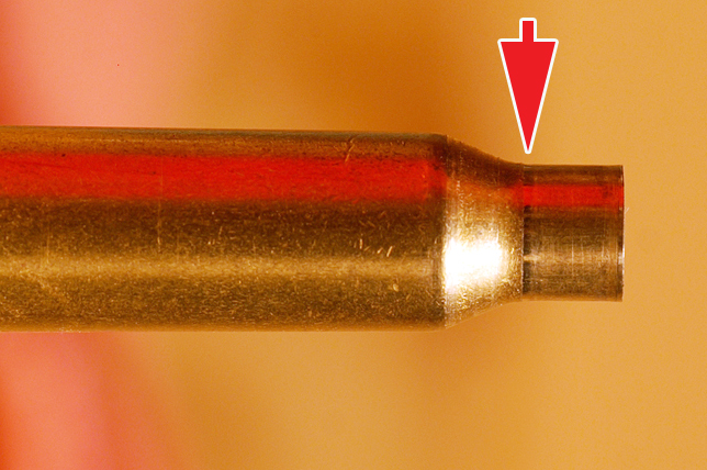 Neck-bushing-style dies (in conjunction with full-length sizing die body) seem like a really good idea, and they can be — but they are another step in controlling case dimensions that most of us don’t want to take or need to take. My biggest issue with bushing dies is that they don’t size the full length of the case neck, and that can create problems. The arrow points to the small area of the case neck that is sized.