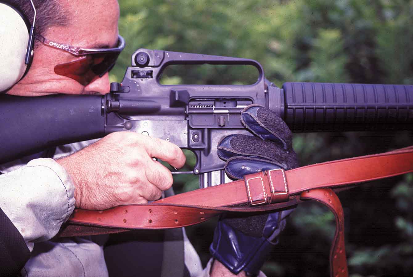 Glen Zediker holding Ar-15 with competition glove