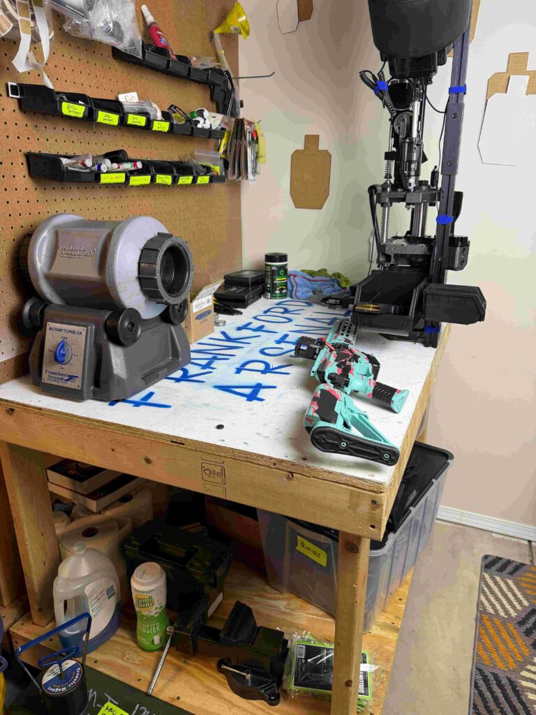 A 4x4 reloading bench that accommodates a Frankford Arsenal X-10 and includes a peg board backer to make the most out of limited space.