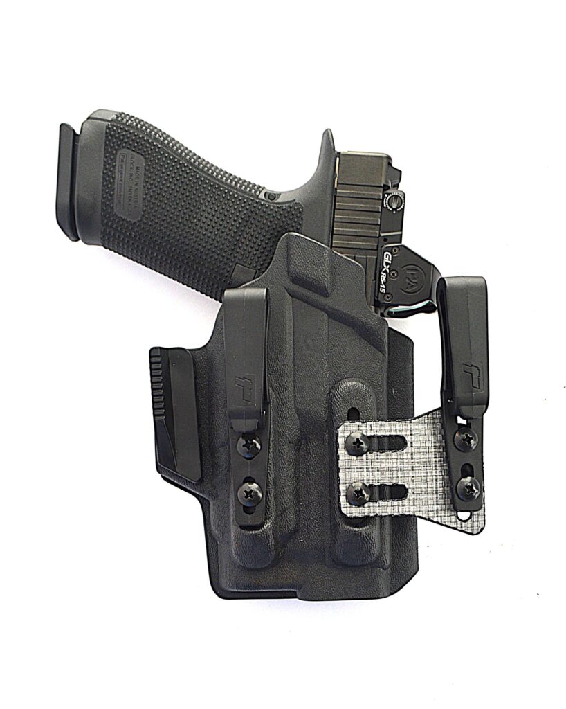 Pistol in holster with white background