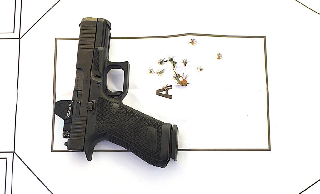 Pistol lying on top of used target