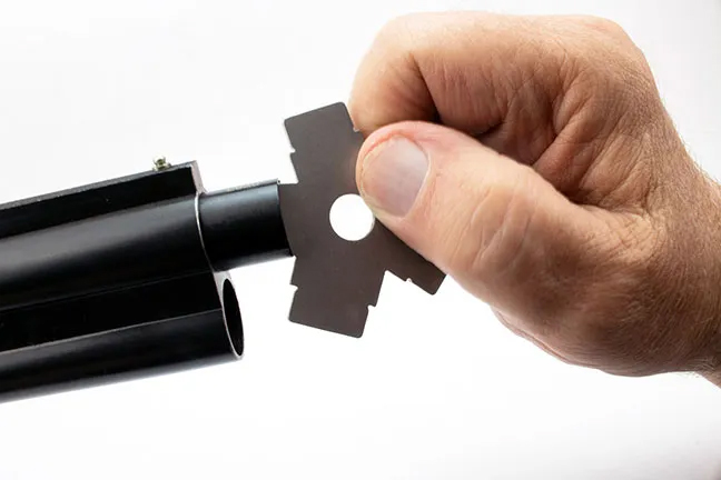 shotgun chokes being adjusted
