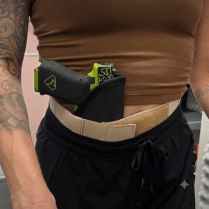 Image of a Person Wearing a Sticky Holster Brand Holster inside the waistband