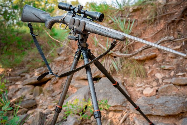 rifle on tripod