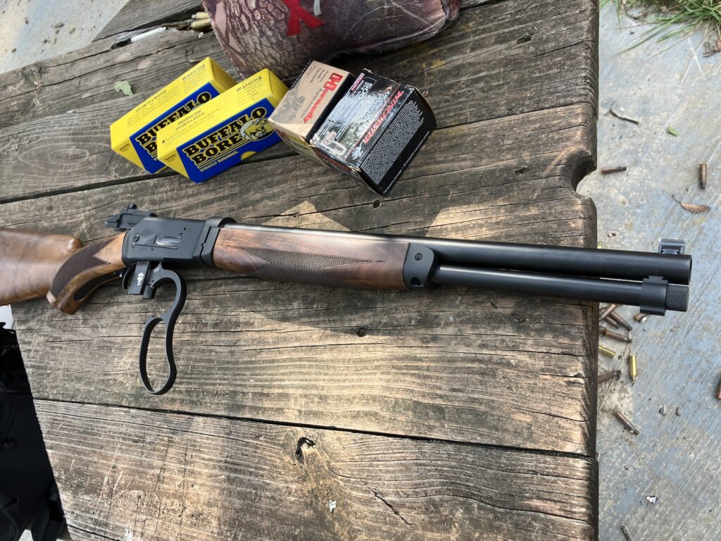 Rifle fully assembled on bench showcasing gap