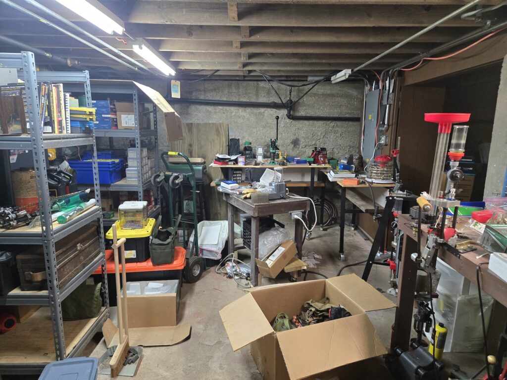 disorganized room full of boxes and tools