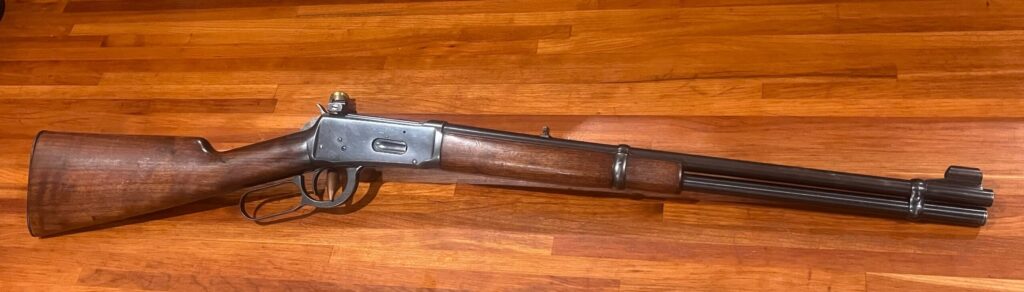 rifle on wooden floor