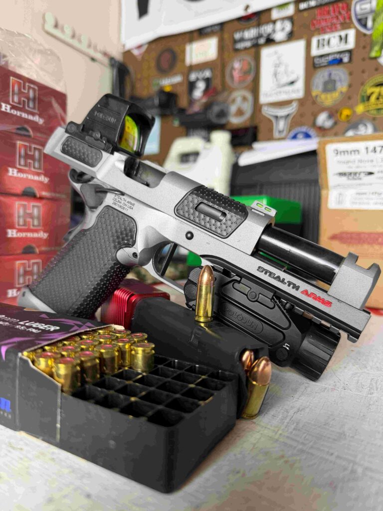 Photo of comp gun with comp ammo